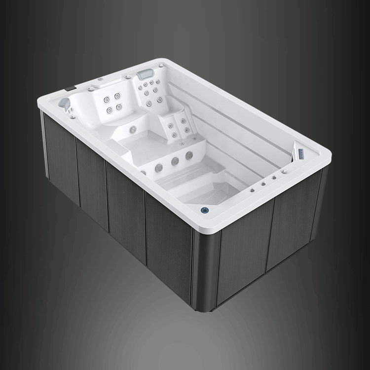 The EasyLife 4.4 by BETA Wellness is a sleek, modern rectangular hot tub with multiple seating areas and numerous jets, featuring a contrasting white interior and black exterior panels, shown on a dark gray background.